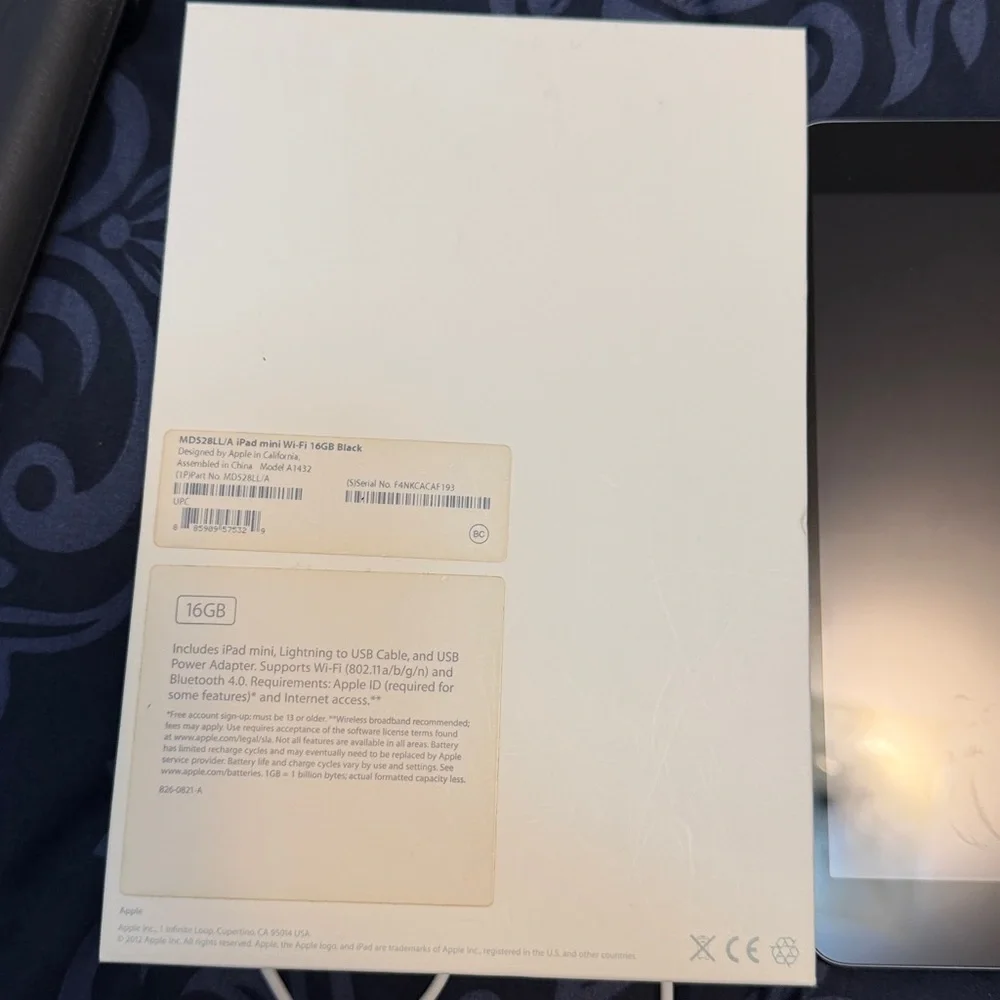 Black Tablet with Silver Trim 16gb Apple IPad mini comes with an otter box case